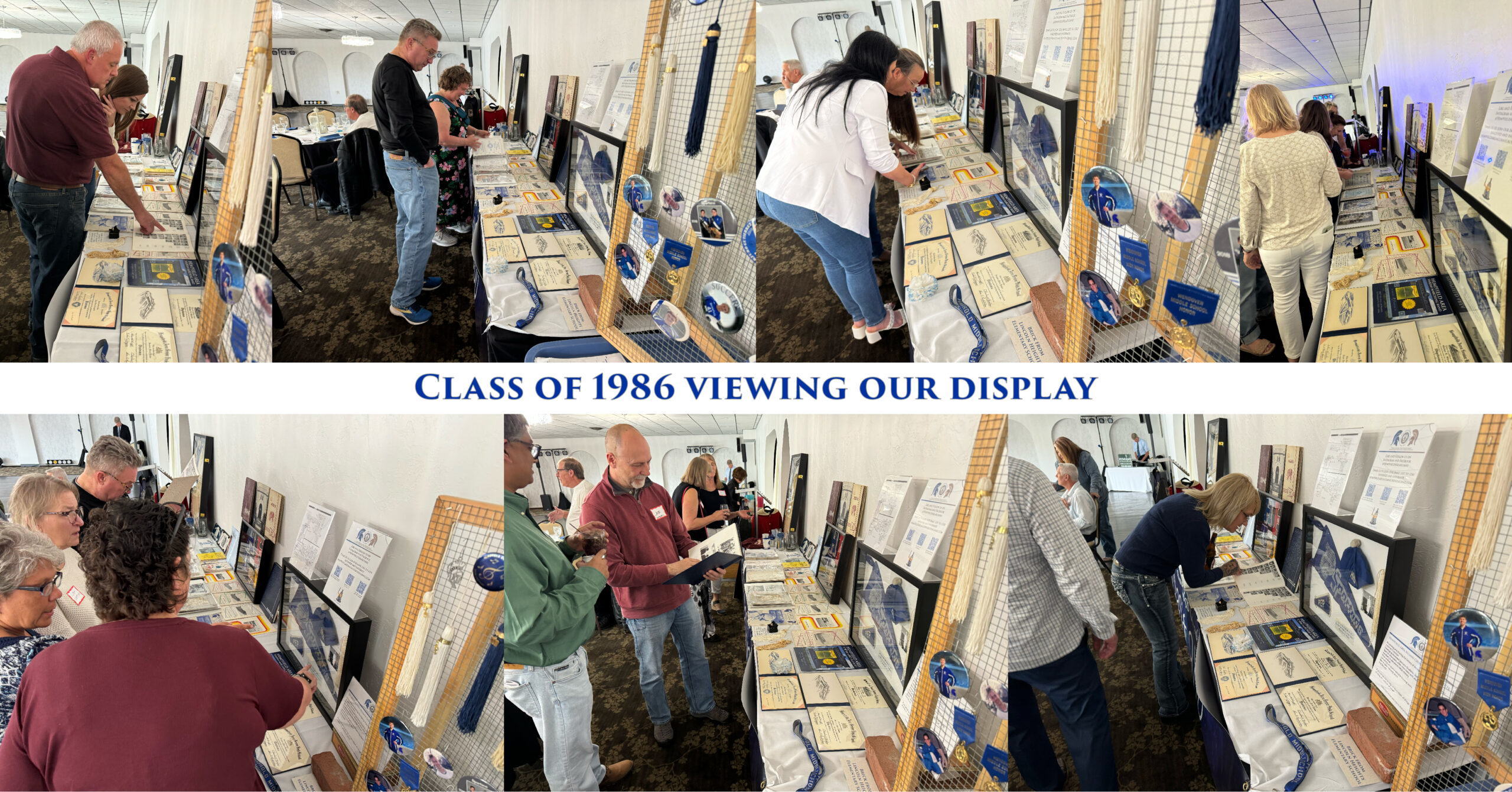 Class of 1986 viewing the Alumni Archive display